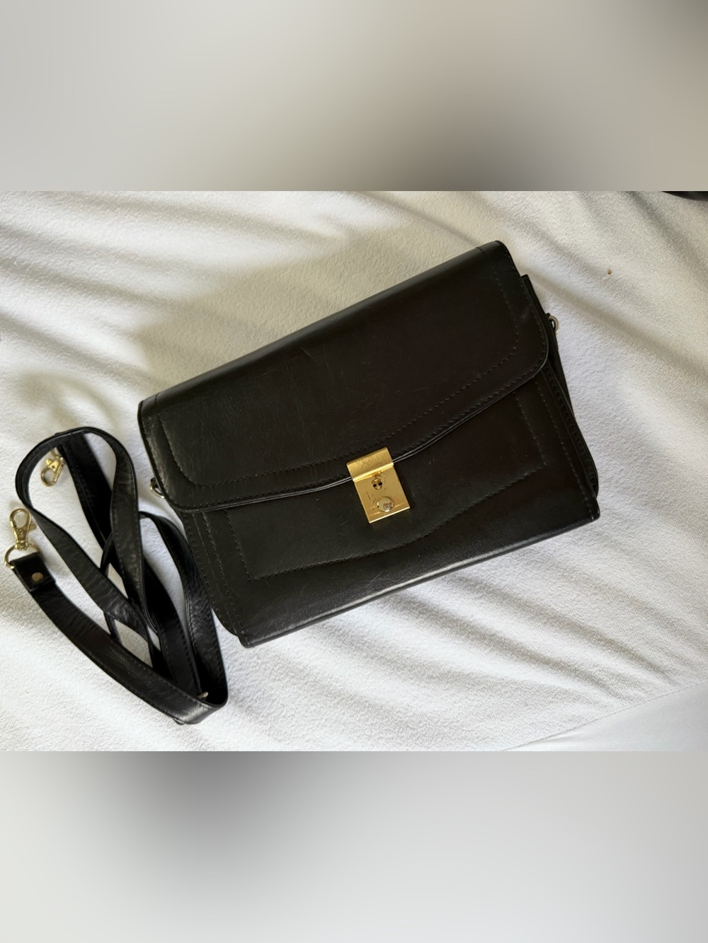 Classic Black Leather Crossbody Bag with Gold Lock